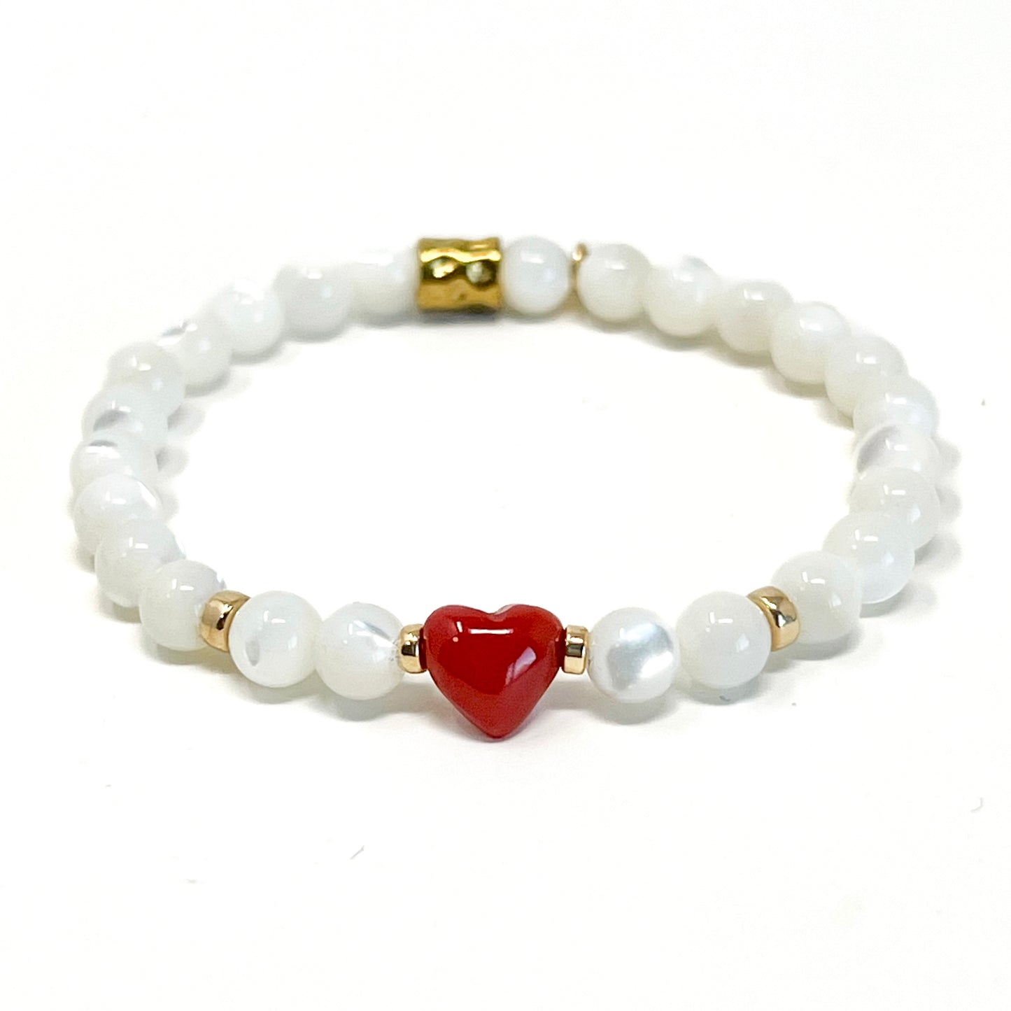 Bracelet avec un coeur en Corail et ses perles de Nacre Enéa