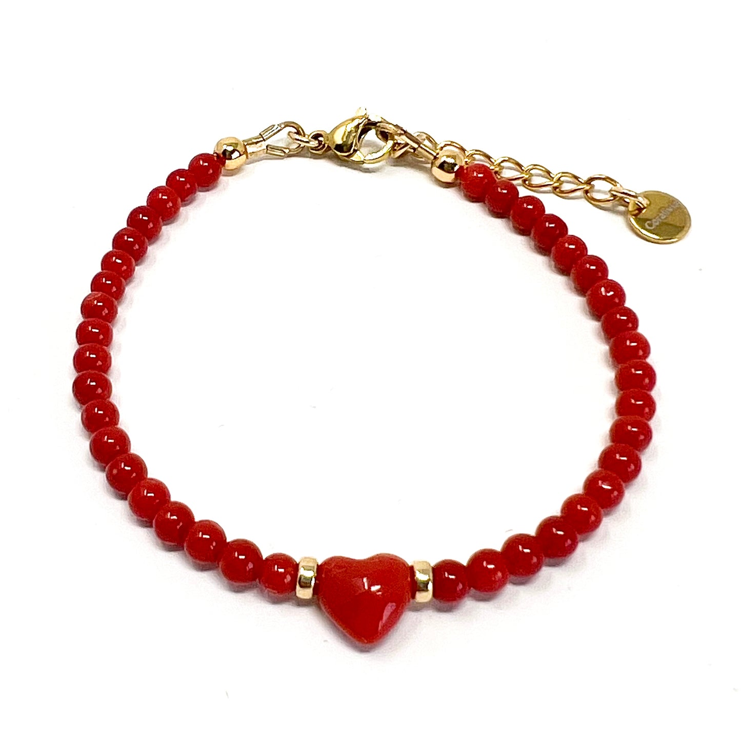 Bracelet en Corail rouge de Méditerranée et cœur en Corail – Bijou porte-bonheur femme.
Ce bracelet élégant associe des perles de Corail rouge de Méditerranée, des rondelles en gold-filled, et un cœur central en Corail.