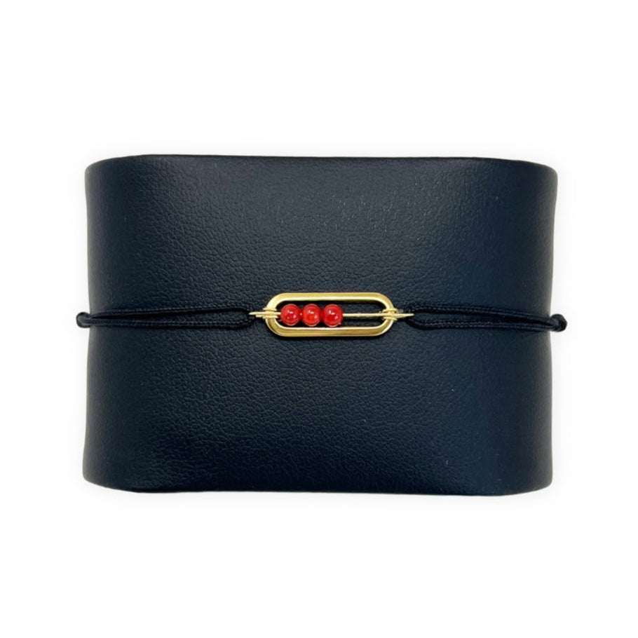 Bracelet enfant Shinny en cordon noir avec acier inoxydable doré et perles de Corail rouge de Méditerranée