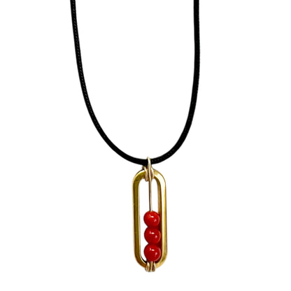 collier cordon noir pendentif corail rouge de Méditerranée bijou artisanal