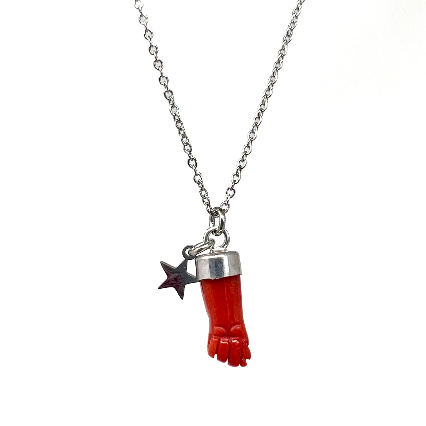 Nina child's silver necklace - red coral fist