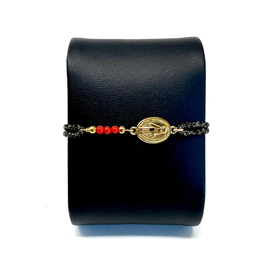 Bracelet enfant Marie en cordon noir tressé avec médaille de la Vierge Marie, perles de Corail rouge de Méditerranée et création artisanale corse
