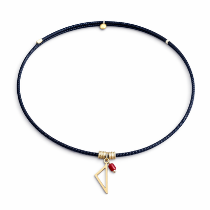 Collier enfant Isula en cordon noir avec pendentif Corse doré et tube de Corail rouge de Méditerranée