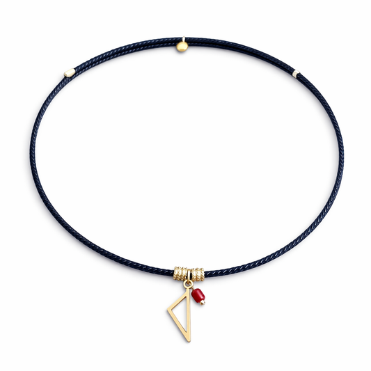 Collier enfant Isula en cordon noir avec pendentif Corse doré et tube de Corail rouge de Méditerranée